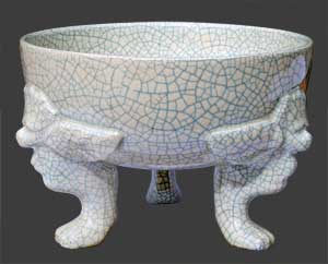 Vase tripode