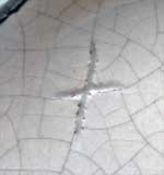 Marque en creux en forme de croix