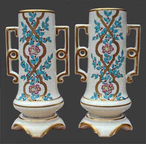 Paire de vases en émaux cernés