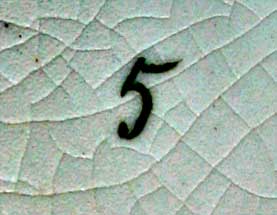 Vue d'une marque au pinçeau, le chiffre 5